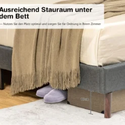 Gepolstertes Bettgestell modernes Bett mit gestepptem Kopfteil Massivholzlatten stützen die Matratzenbasis Grau