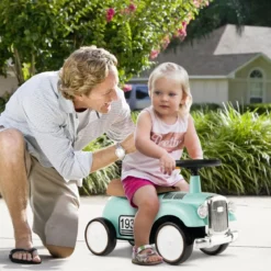 Rutschauto Rutscherfahrzeug mit Stauraum & Kippschutz Kinderfahrzeug mit Lenkrad 58 x 27 x 34 cm Grün