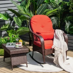 Schaukelstuhl Rattan mit roten Kissen Relaxliege Rattanschaukelstuhl 67 x 87 x 95 cm Braun