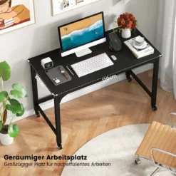 Schreibtisch mit Rollen & Metallrahmen Computertisch Bürotisch 120 x 60 x 76 cm Schwarz