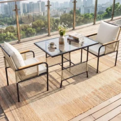 3-teiliges Garten-Lounge-Set aus Rattan platzsparendes Outdoor-Ess-Set mit Kissen rechteckiger Gartentisch Weiß