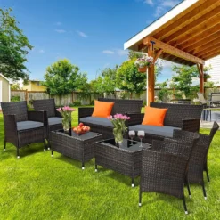4 TLG. Outdoor Terrassenmöbel Set aus PE Rattan mit Gehärtetem Glastisch & Kissen Grau